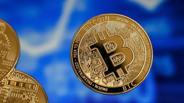 Bitcoin mantiene el nivel de 58,000 dólares