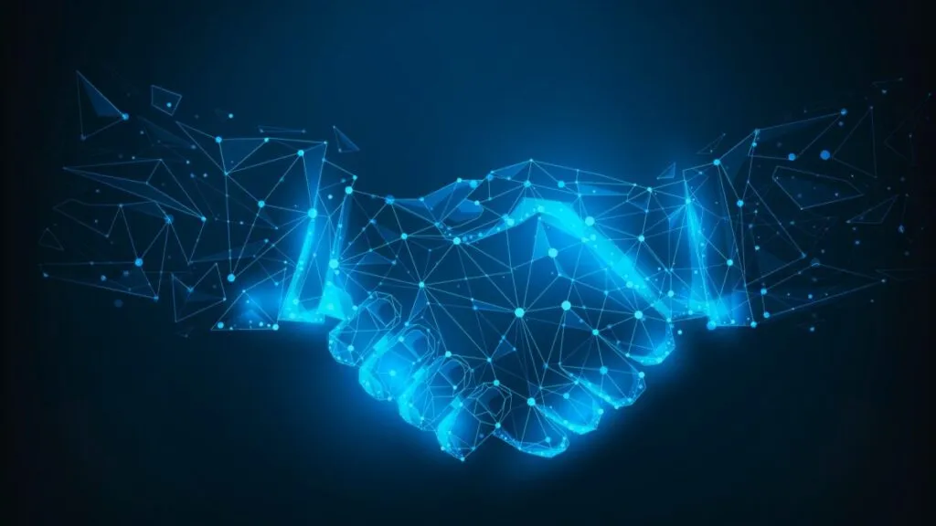 Un apretón de manos digital con estética futurista simboliza la cooperación cripto entre Reino Unido y Estados Unidos.