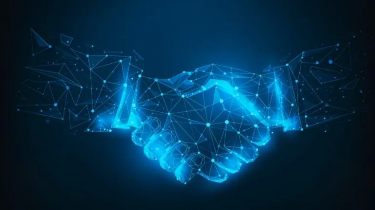 Un apretón de manos digital con estética futurista simboliza la cooperación cripto entre Reino Unido y Estados Unidos.