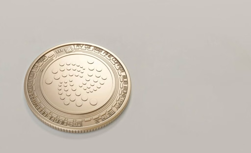 Gráfico del precio de la criptomoneda IOTA y representación visual de su tecnología Tangle en el mercado de criptomonedas emergentes