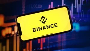 Logo de Binance sobre un entorno financiero digital relacionado con la regulación MiCA en Europa